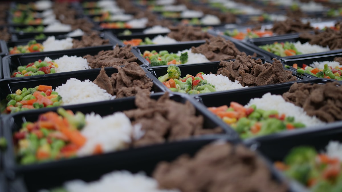 Nutritionist reviewing balanced meal preparation and food components